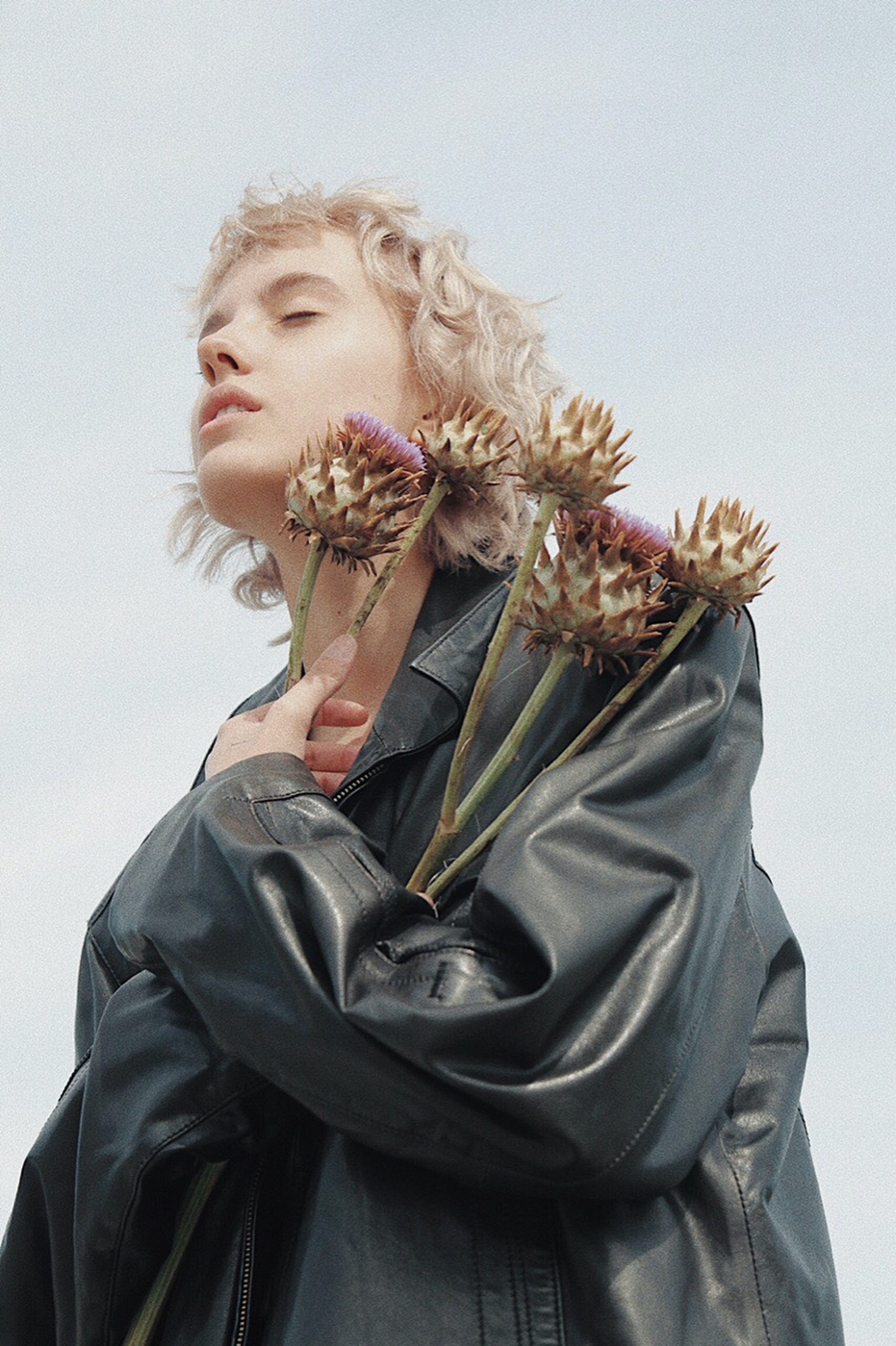 Fashion portrait with flowers